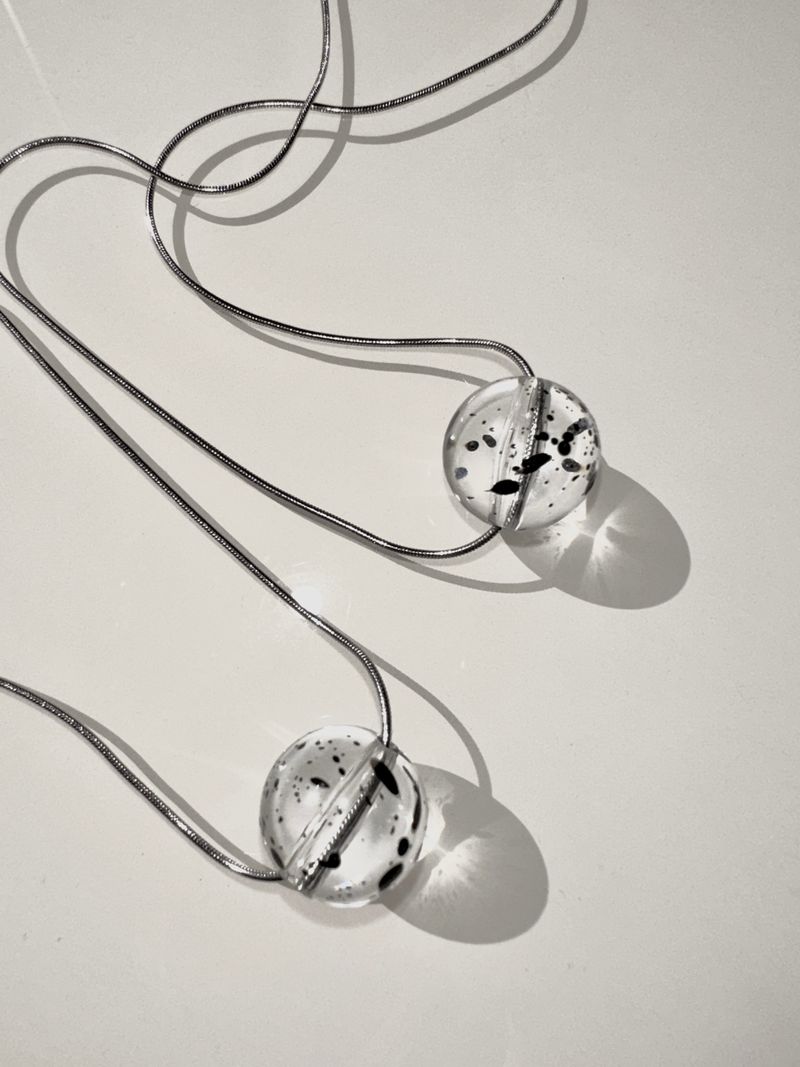 BUZZERBE(ブザービー)の「dot clear ball necklace(Accessories)」