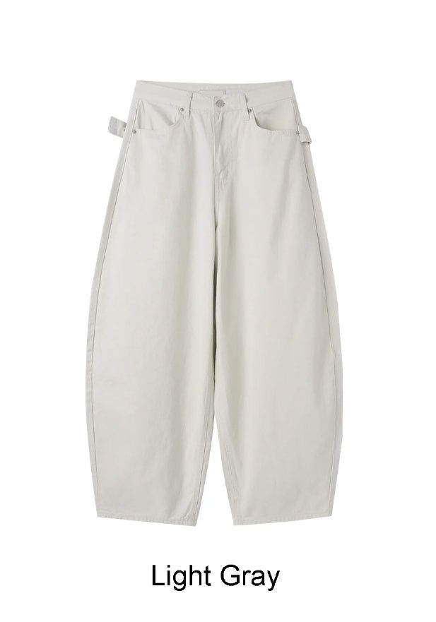 Pale studded strap pants