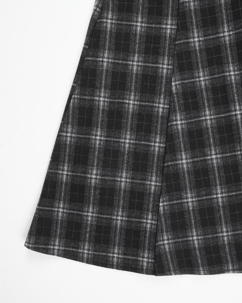 A BLACK CHECK SKIRT