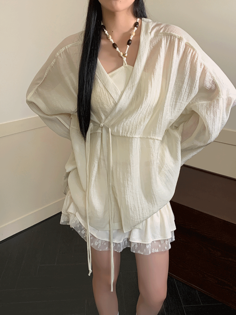 dereborujo（ドレボルゾー）の「Loose fit daisy wrap blouse（Tops）」