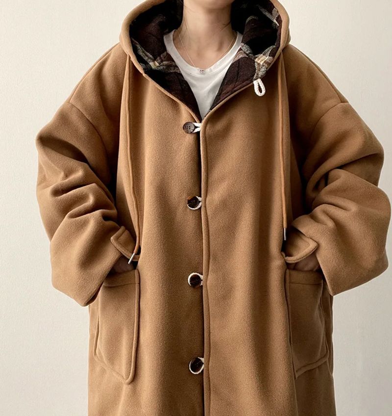 Melty King Bakshi woolen pocket long hooded coat