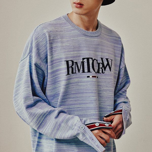 ROMANTIC CROWN（ロマンティッククラウン）の「BUTTON SLEEVE KNIT TOP_MELANGE SKY BLUE（Tops）」