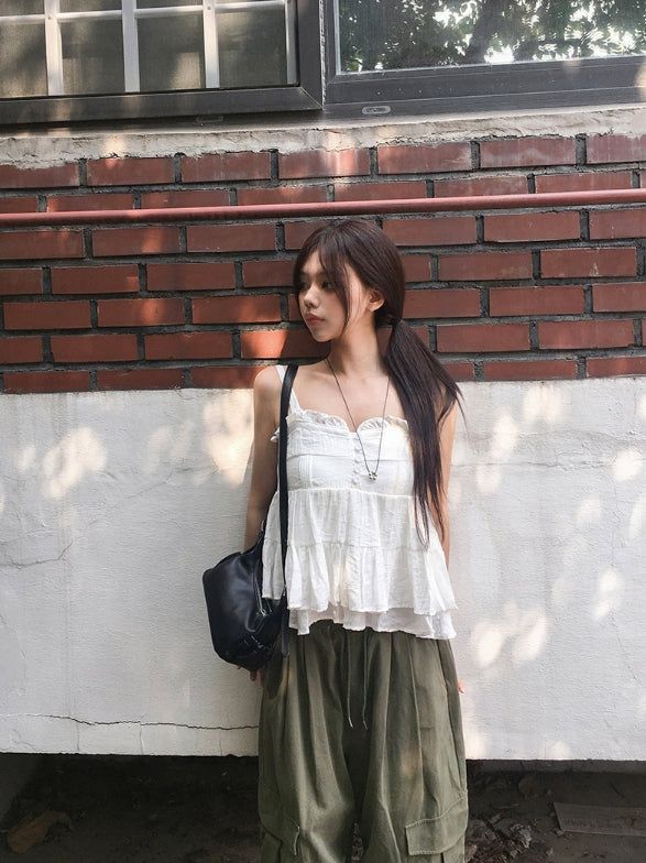 anyonemore（エニーワンモアー）の「Mealing Frill Button Lace Flared Sleeveless Blouse（Tops）」