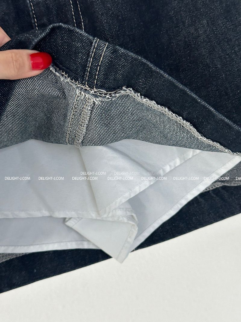 a raw paper stitch jean skirt