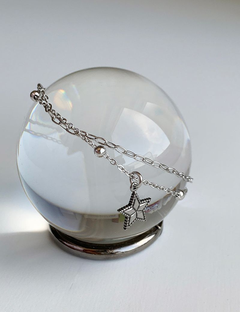 Two chain layered star bracelets