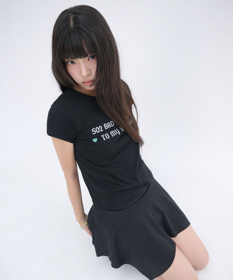 ITZAVIBE（イッザバイブ）の「502 GLITTER LETTERING T SHIRT - BLACK（Tops）」