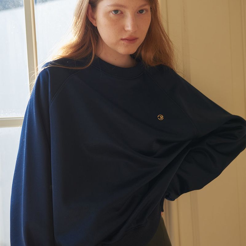 CORCA（コルカ）の「Glossy Logo Ring Sweat Shirts Navy（Tops）」