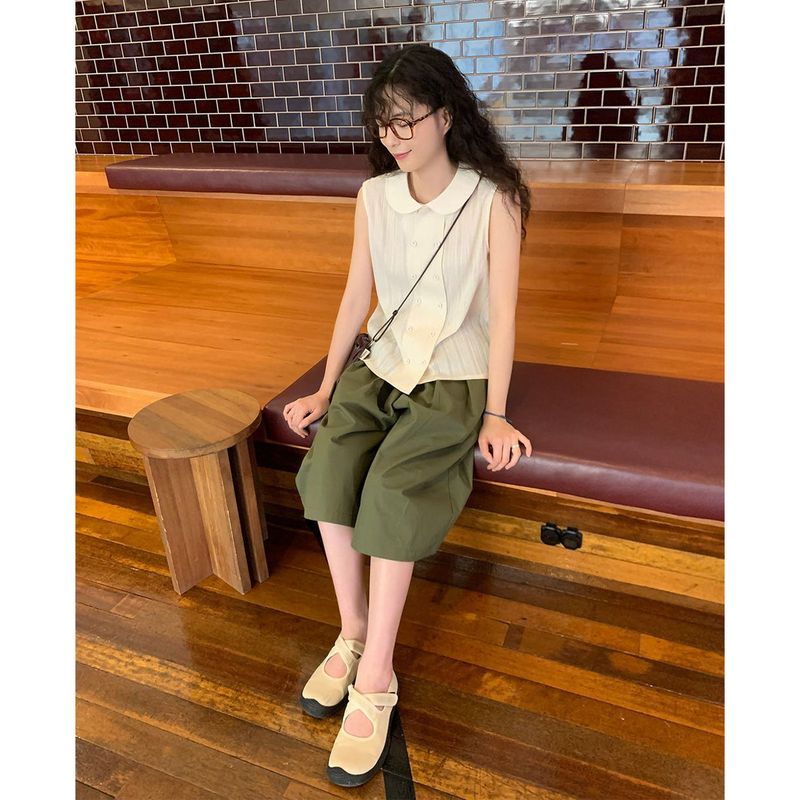 burring sleeveless blouse