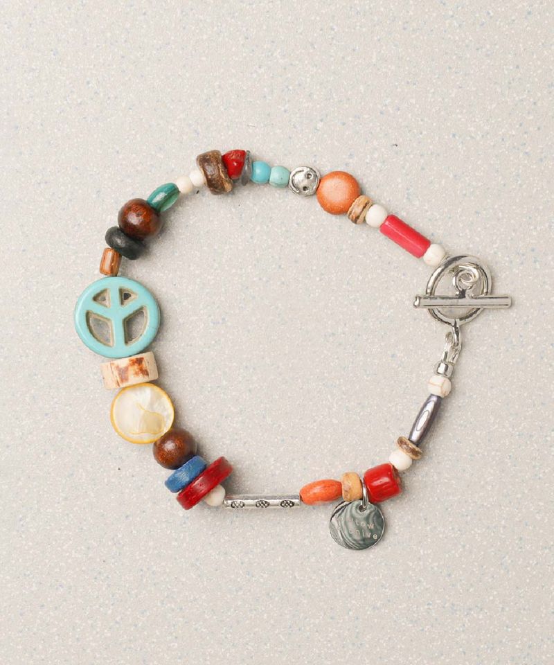 towtow.archive（トゥトゥ アーカイブ）の「PEACEMARK SYMBOL BRACELET-TURQUOISE :  ARCHIVE-001（Accessories）」