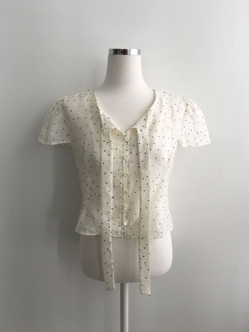 Dot tie puff blouse