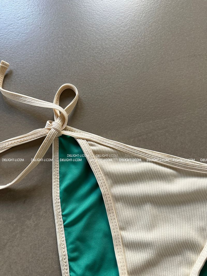 a set of 2 layered colored bikinis