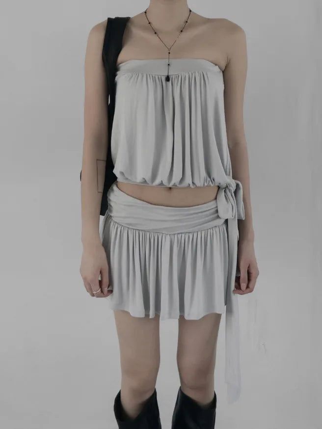 mnem（ムネム）の「Whizz Shirring Tube Top（Tops）」