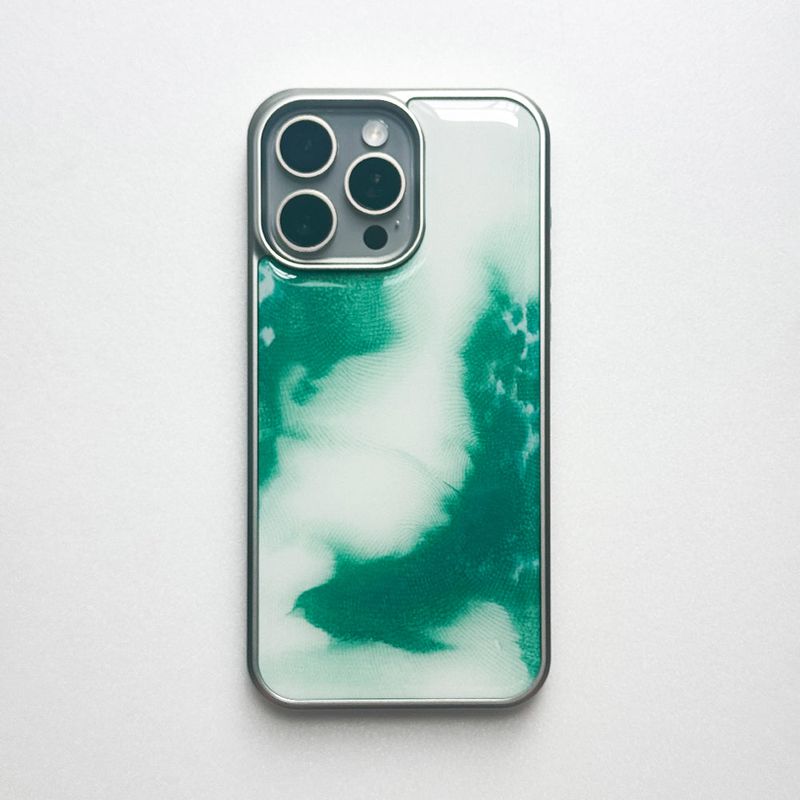 MEMORIESBOUNDARY（メモリーズバウンダリー）の「Soaring Silence Phone Case (SV_Green)（Smartphone Accessories）」
