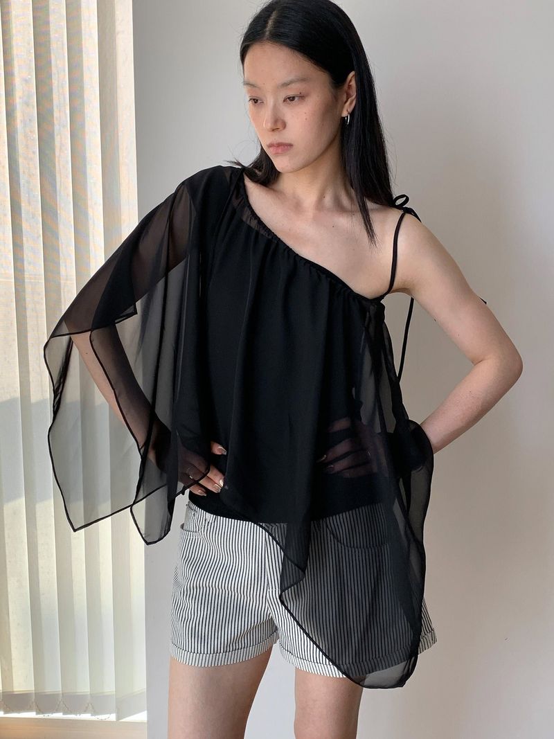 dereborujo（ドレボルゾー）の「unbalanced chiffon see-through frill blouse （Tops）」
