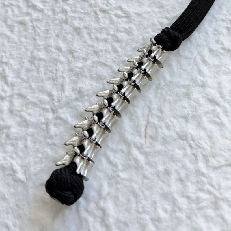 Bone Link Cord Charm