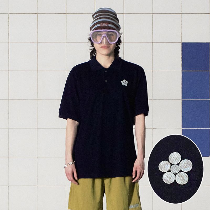 UNALLOYED（アナロイド）の「BUTTON FLOWER PK POLO SHIRT / NAVY（Tops）」