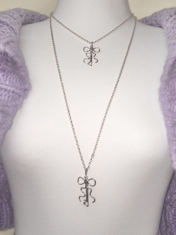 DANI(ダニ)の「Key Ribbon Necklace(Long)(Accessories)」