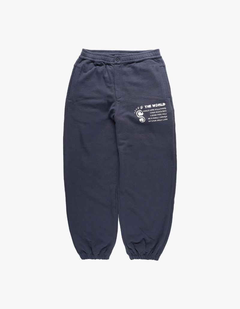 thewarld（ザワールド）の「FOOT PRINT LOGO SWEAT PANTS NAVY（Pants）」