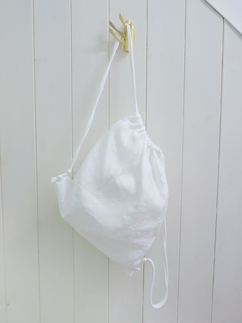 sloppipie（スロッピパイ）の「glossy petal string bag [white]（Bags）」