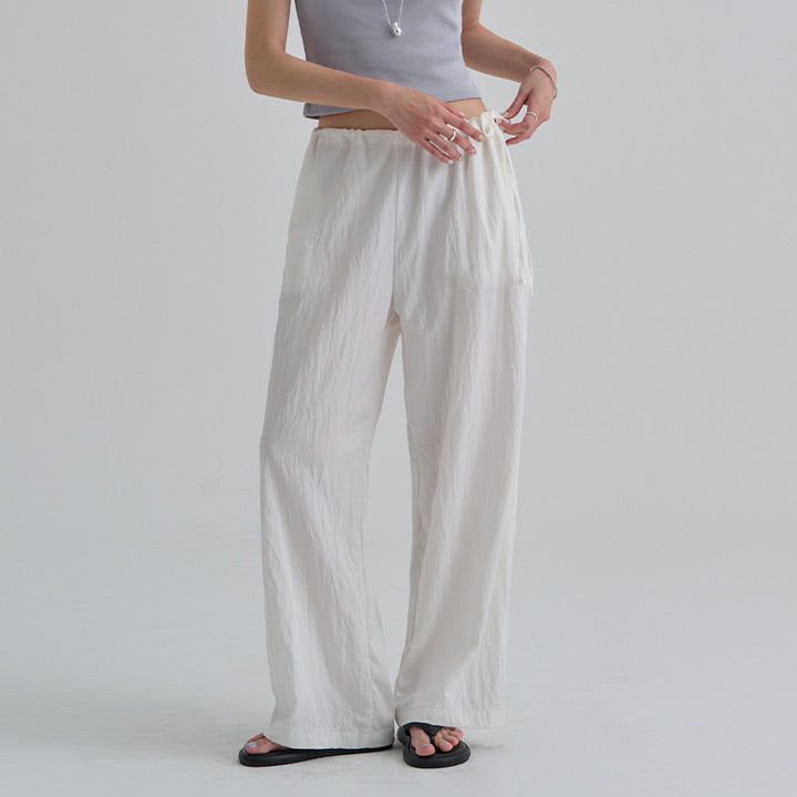 blitti（ブリッティ）の「[Tringle] Nylon Side String Wide Pants -2color（Pants）」