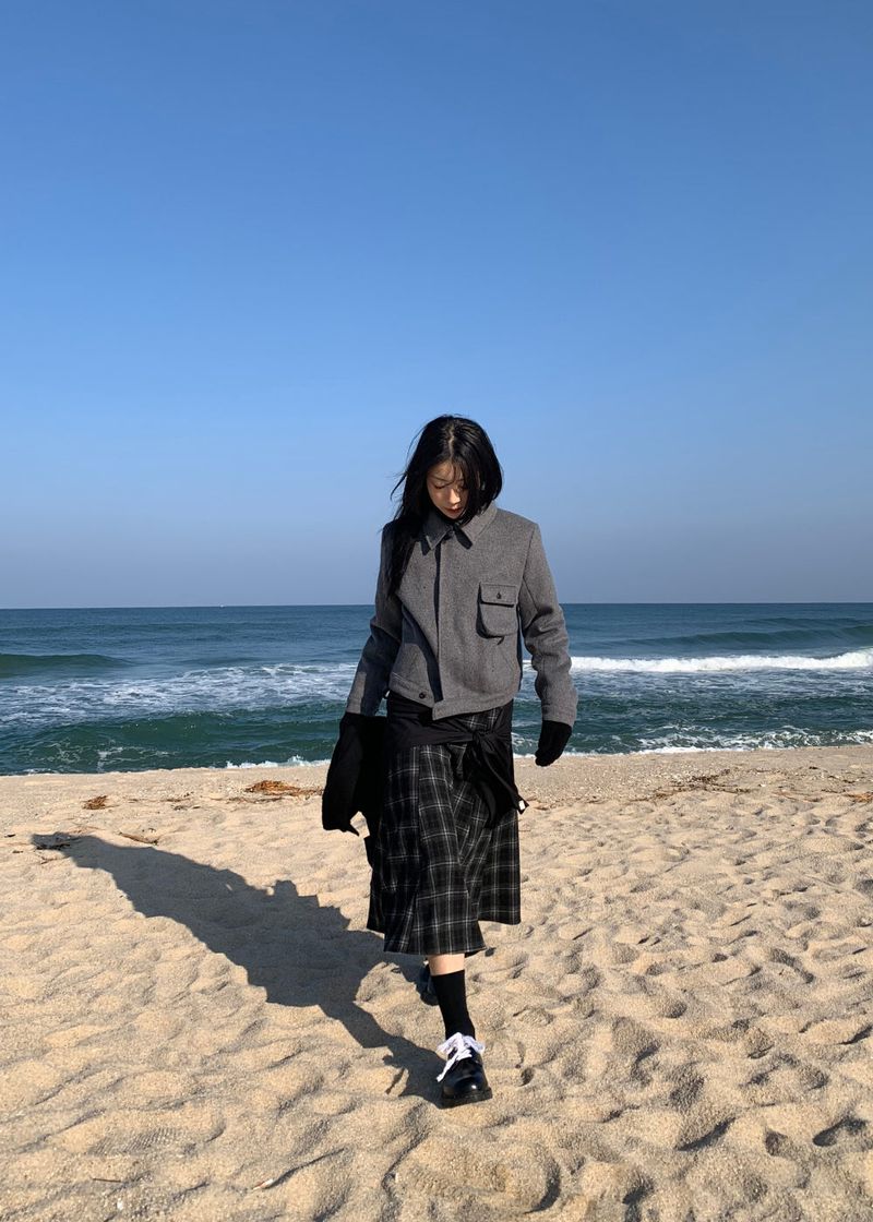 A BLACK CHECK SKIRT