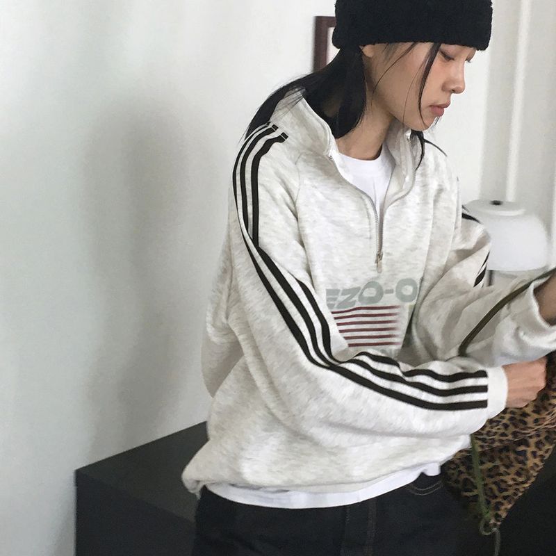 WONDER WONDER(ワンダーワンダー)の「Tvan y2k track oversized fit semi zip-up sweatshirt(Tops)」