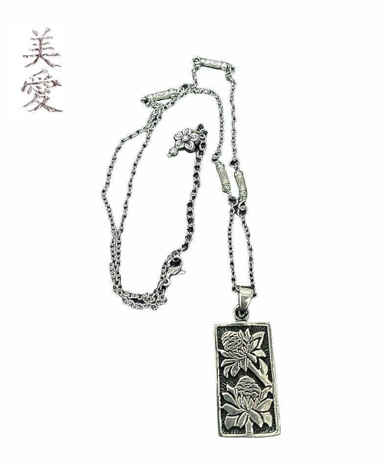 MIAE（ミアイ）の「花 ロータスネックレス (シルバー)（アクセサリー）」