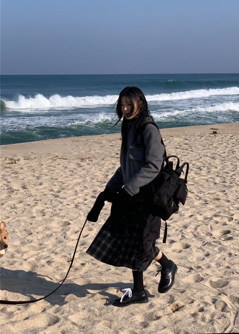A BLACK CHECK SKIRT
