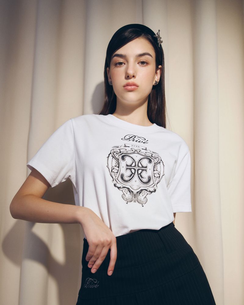 DVRK（ダーク）の「DVRK PRIVÉ UNI LOGO BABY TEE - WHITE（Tops）」