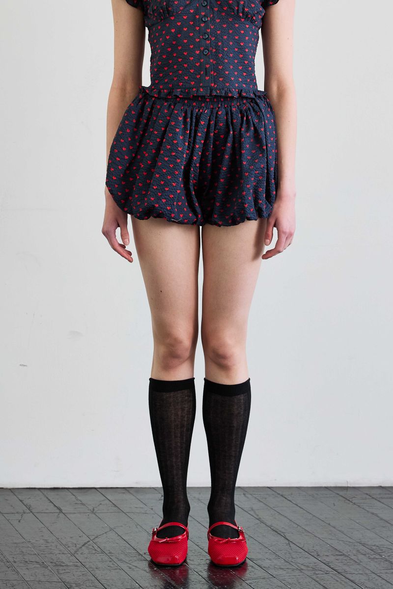ARIKIM（アリキム）の「MINI HEART BALLOON SKIRT PANTS / NAVY（Skirts）」