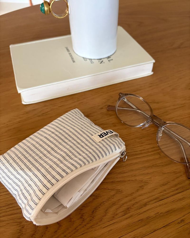 HAVE YOU EVER（ハヴユーエバー）の「Cotton stripe flat pouch - ivory , M size（Accessories）」
