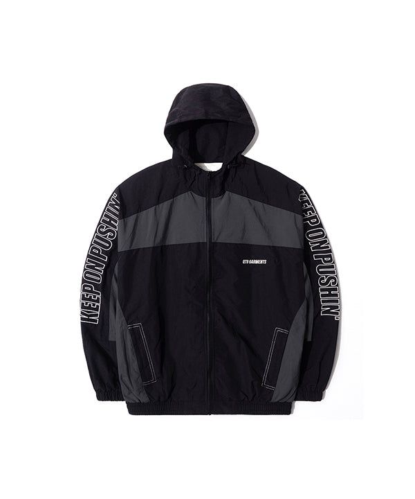 QT8 GARMENTS（キューティーエイトガーメント）の「RG レトロフードトラックジャケット (ブラック/チャコール)（ジャケット/アウター）」