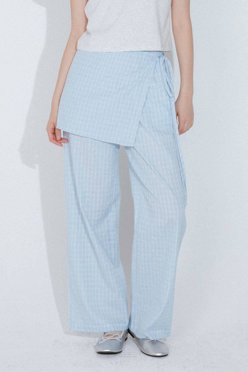 mellotory（メロートリー）の「CHECK WRAP LAYERED PANTS (LIGHT BLUE)（Pants）」