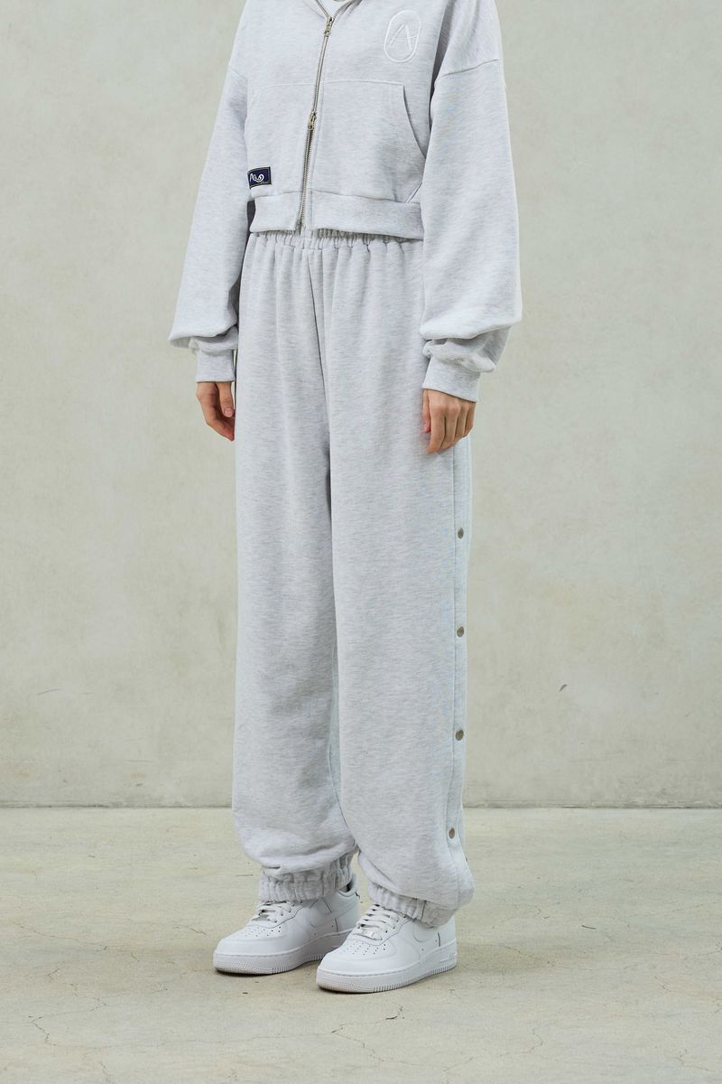 ARIKIM（アリキム）の「PITA SNAP OFF SWEAT PANTS / WHITE-MELANGE（Pants）」