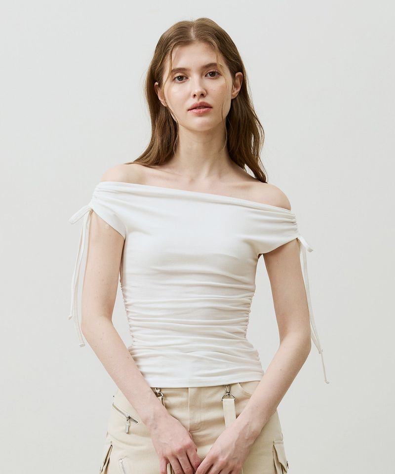 ARIKIM（アリキム）の「LILY OFF-SHOULDER SHIRRING TOP / IVORY（Tops）」