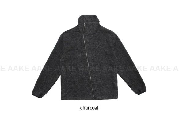 DIAGONAL HIGH-NECK ZIP-UP