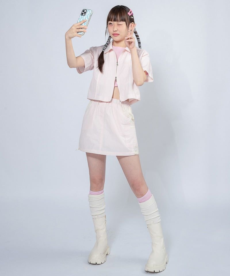 UNUSUALNORMAL（アンユージュアルノーマル）の「WINDY SYMBOL SKIRT _ PINK（Skirts）」