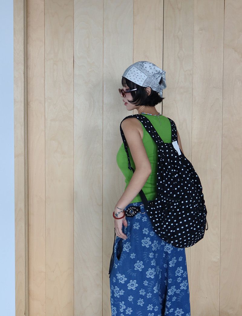 Dot dot string pocket backpack