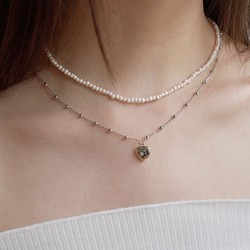 OVT-U（オーブイティーユー）の「Heart & Pearl Two-Way Necklace（Accessories）」