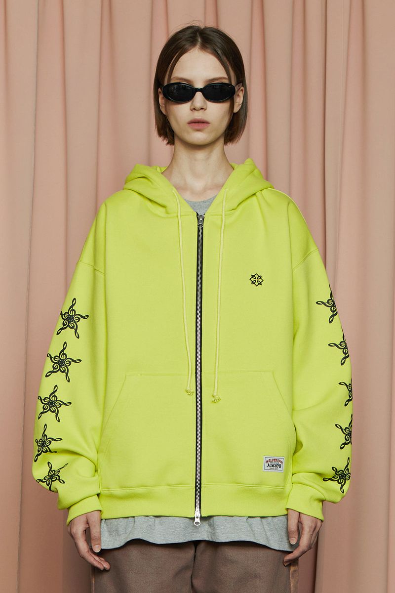UNALLOYED（アナロイド）の「STAR ZIP-UP HOODIE / LIME YELLOW（Tops）」