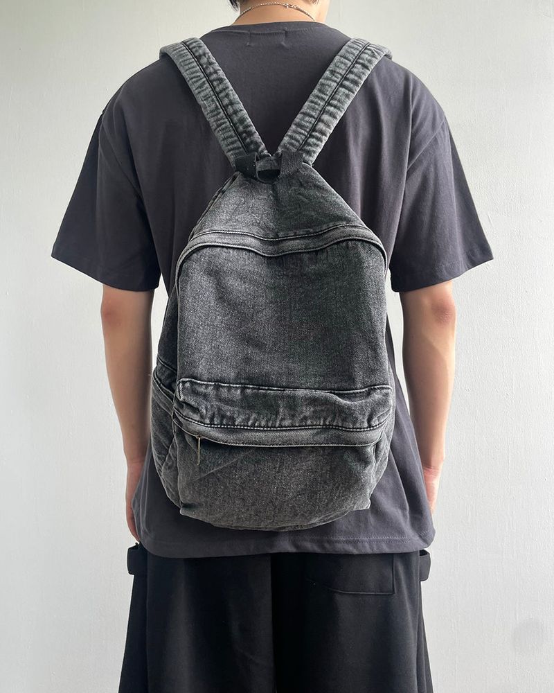 Washed denim backpack