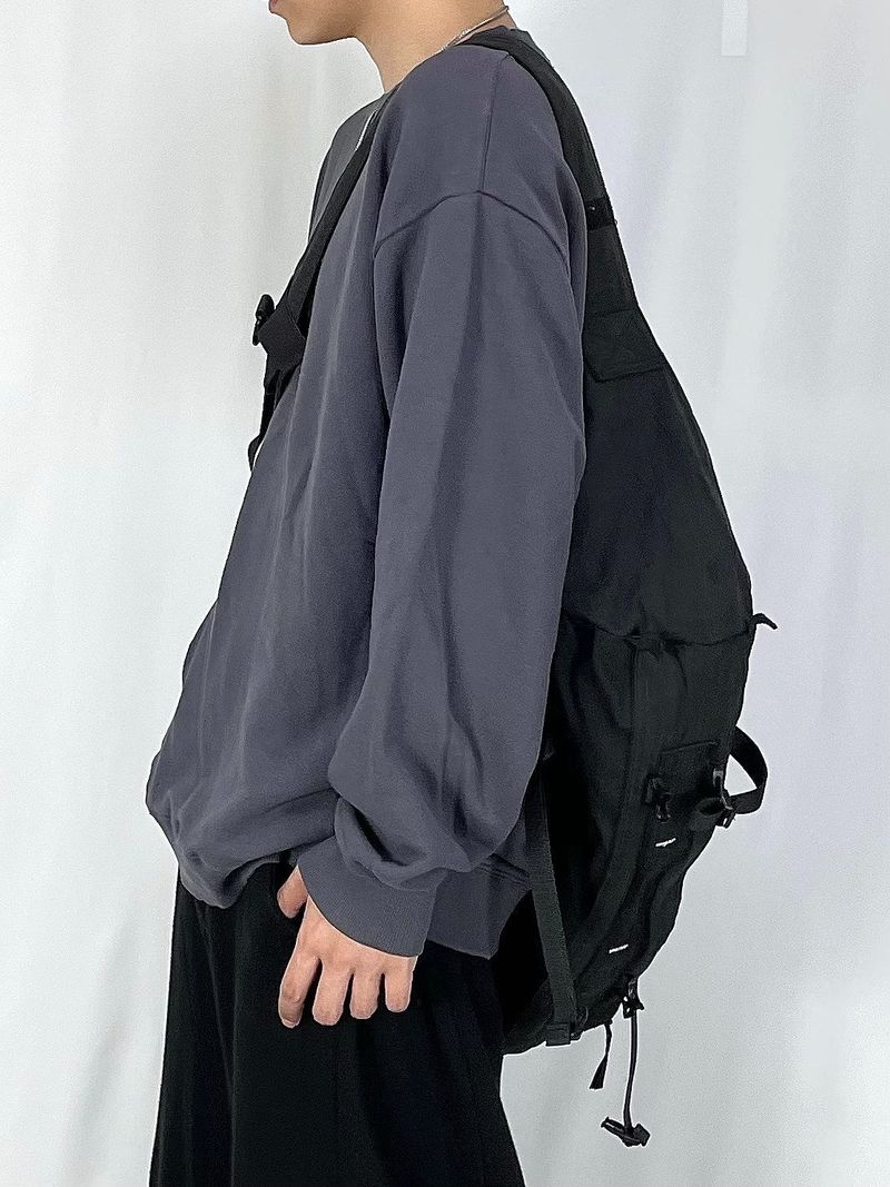 Velcro over sling-bag
