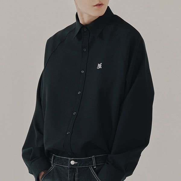 ROMANTIC CROWN(ロマンティッククラウン)の「RAGLAN SLIT SHIRT_BLACK(Tops)」