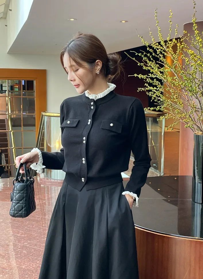 iam mari（アイアム マリ）の「Coten Pearl Frill Knit Cardigan（Tops）」