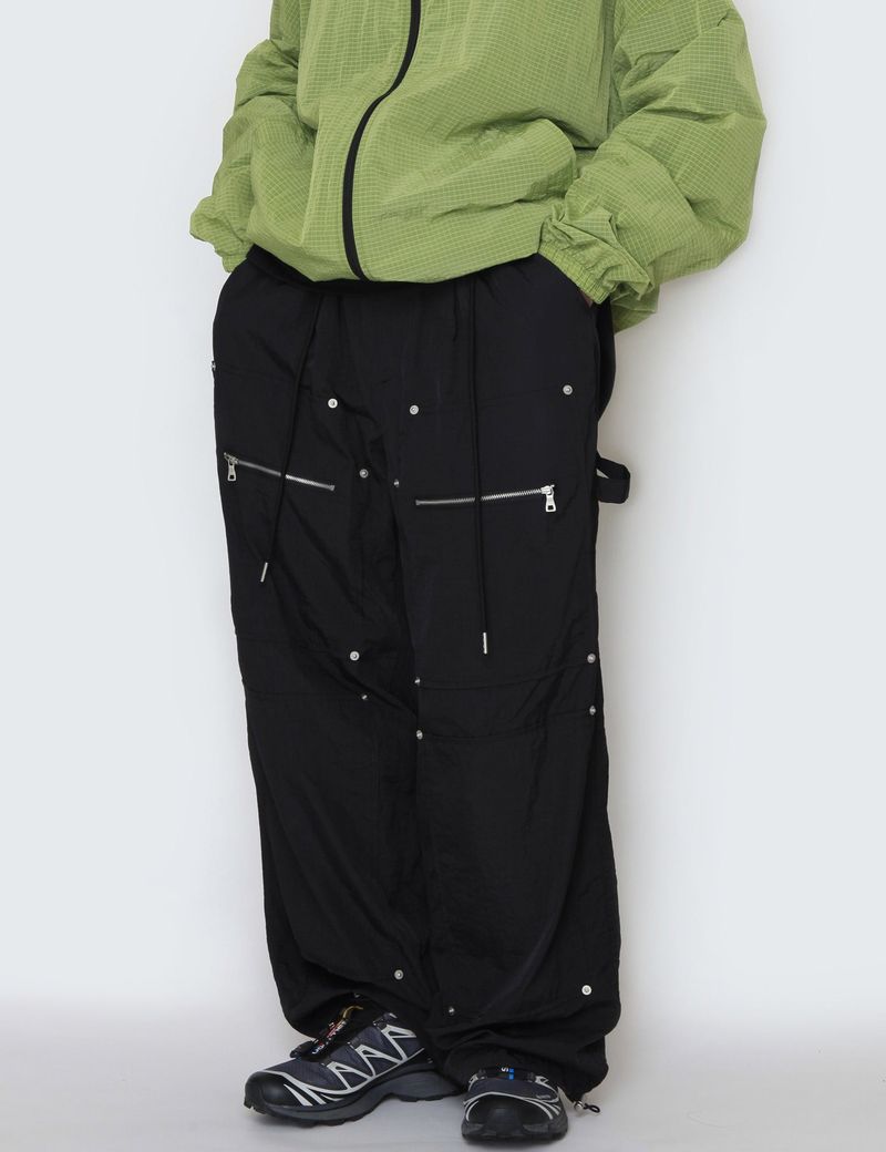 nutellike(ヌテールライク)の「nylon ribat zipper pants(Pants)」
