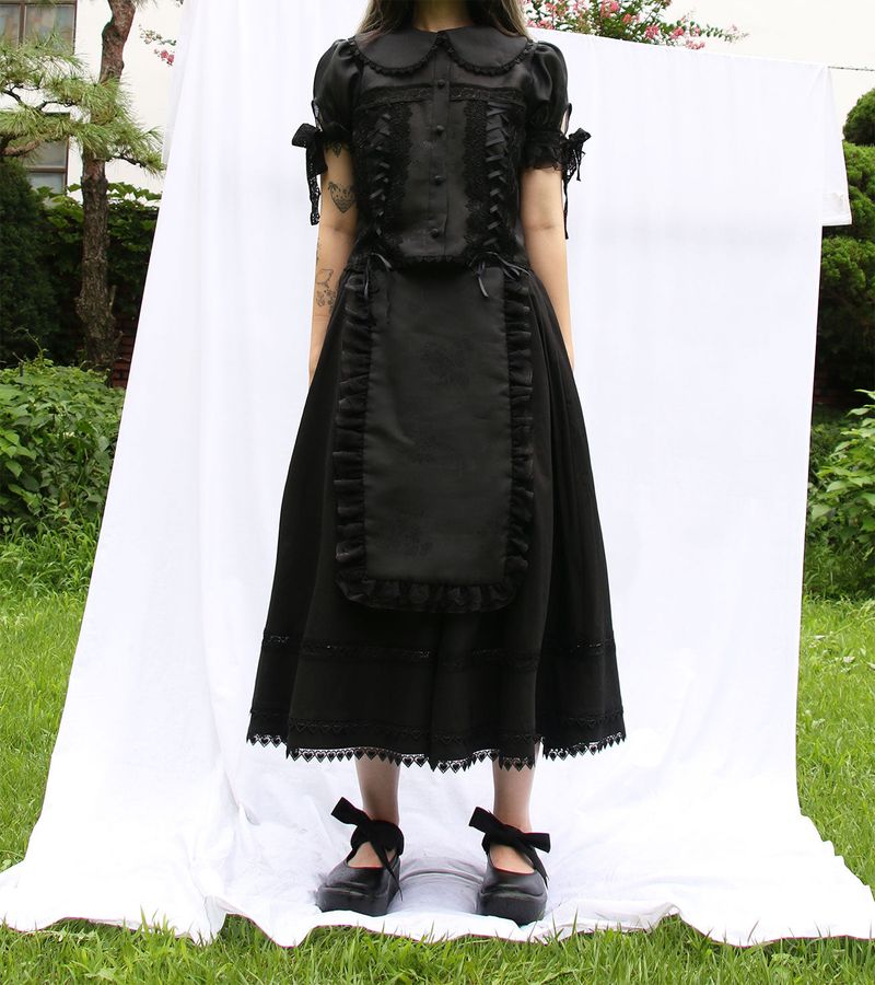 Baquemin（バクミン）の「Apron-Pyeseul Skirt (Black)（Skirts）」