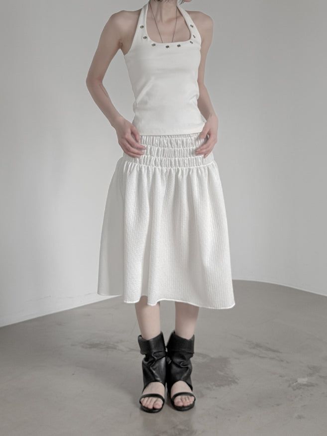 mnem（ムネム）の「Seersucker smocked midi skirt（Skirts）」