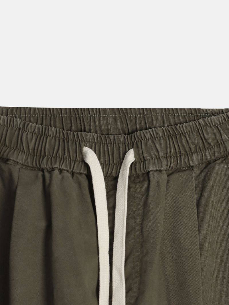 Curved diagonal cargo banding pants