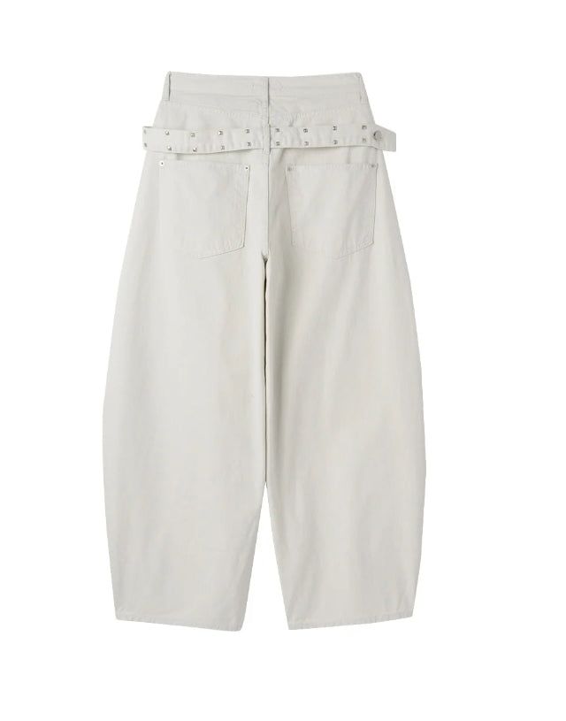 Pale studded strap pants