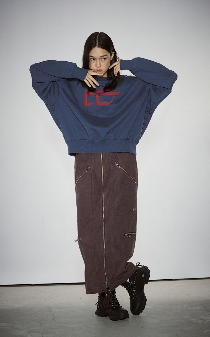 EACH DIFFER(イーチディファー)の「WASHED 2WAY ZIP SKIRT_BROWN(Skirts)」